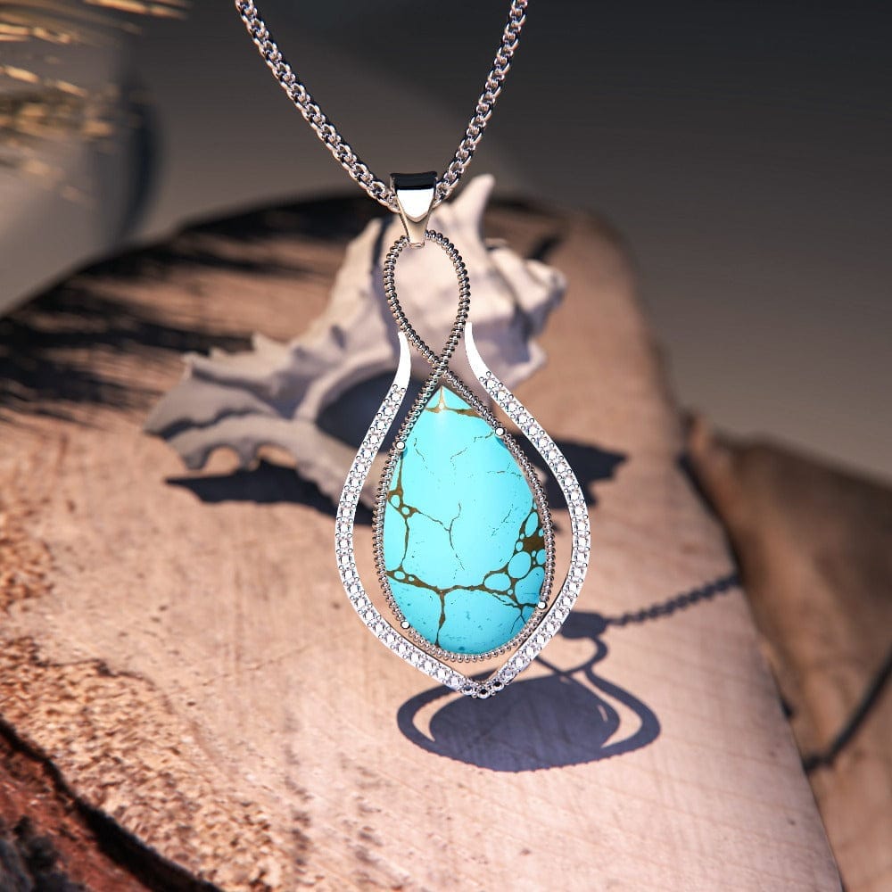 Mermaid's Turquoise Pendant Necklace featuring a turquoise stone set in S925 sterling silver close up zoomed in image of pendant in high detail
