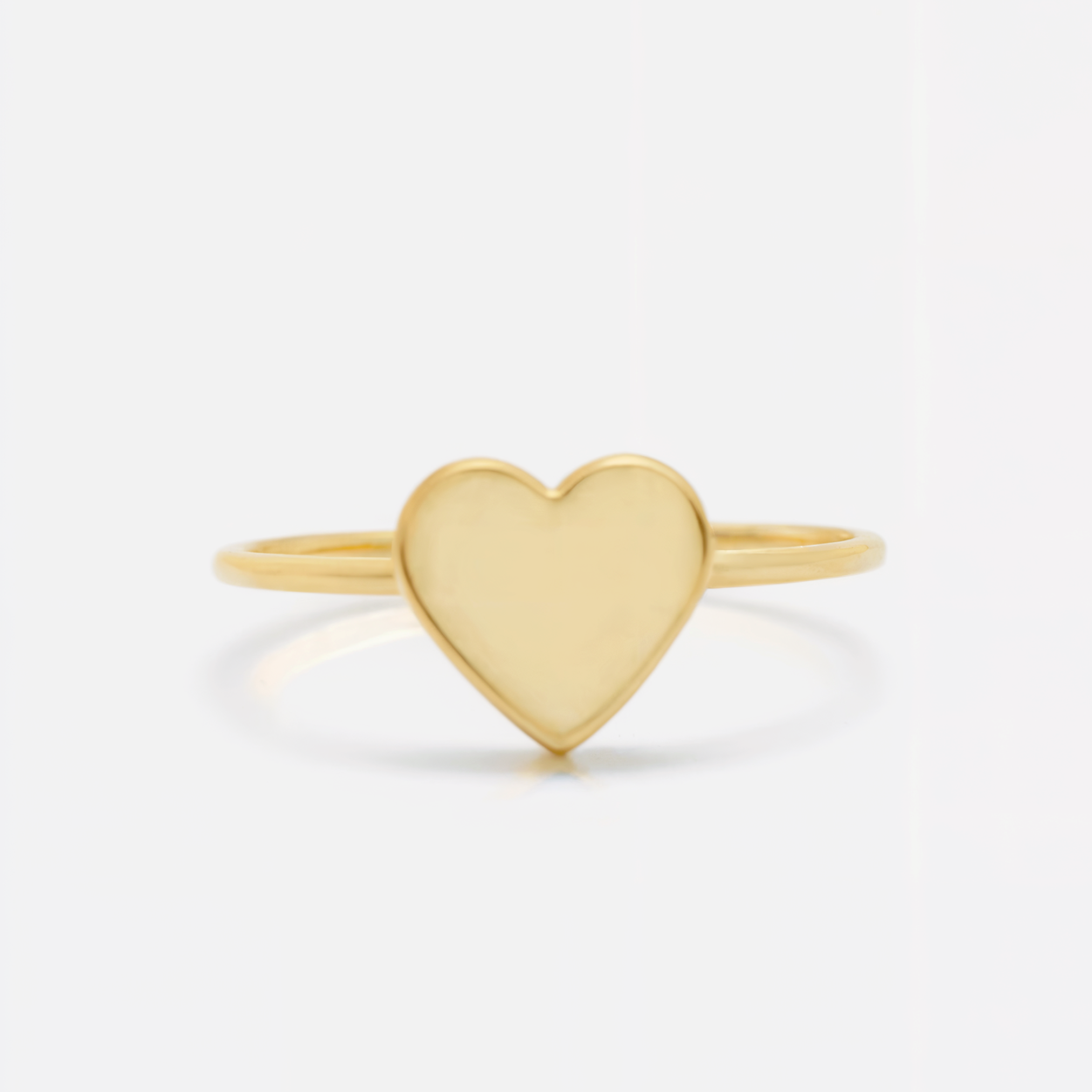 Anillo de corazón de oro