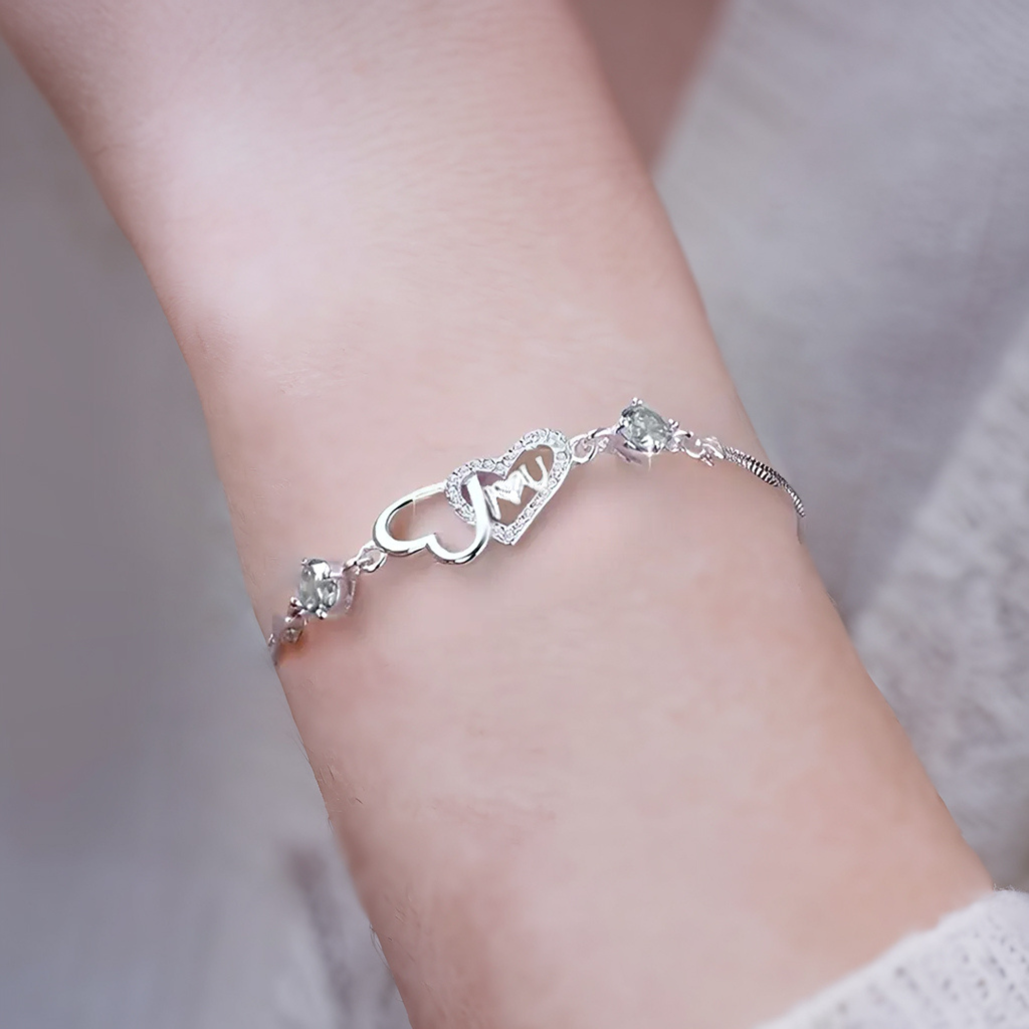 Pulsera de corazón entrelazado