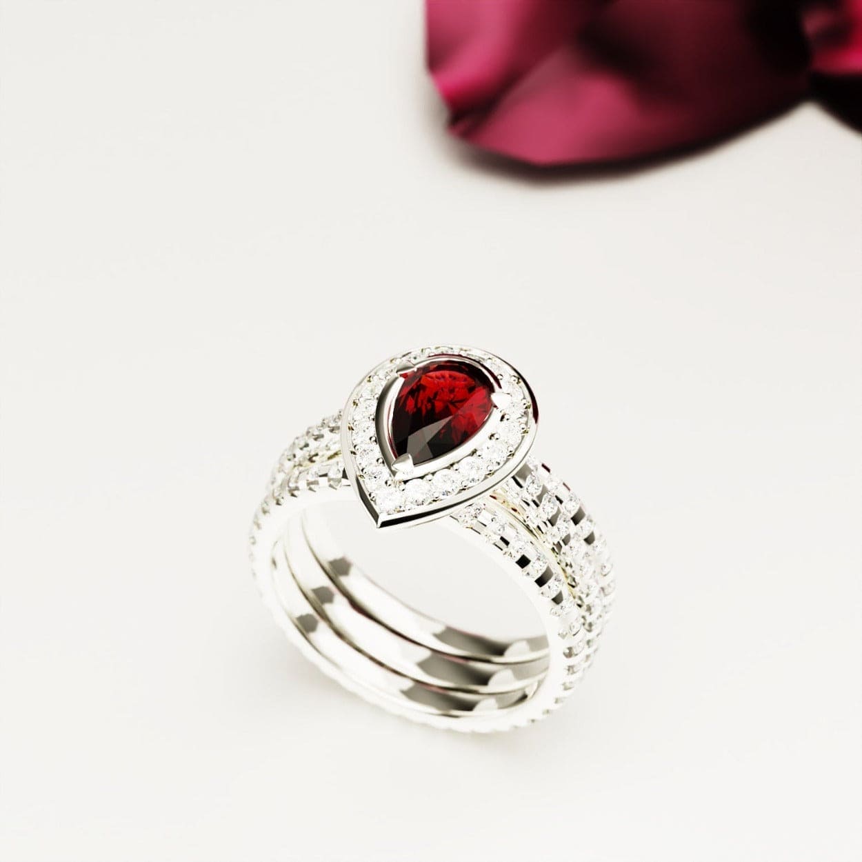 Crimson Teardrop: Pear Shaped Garnet Cut Halo Ring - S925