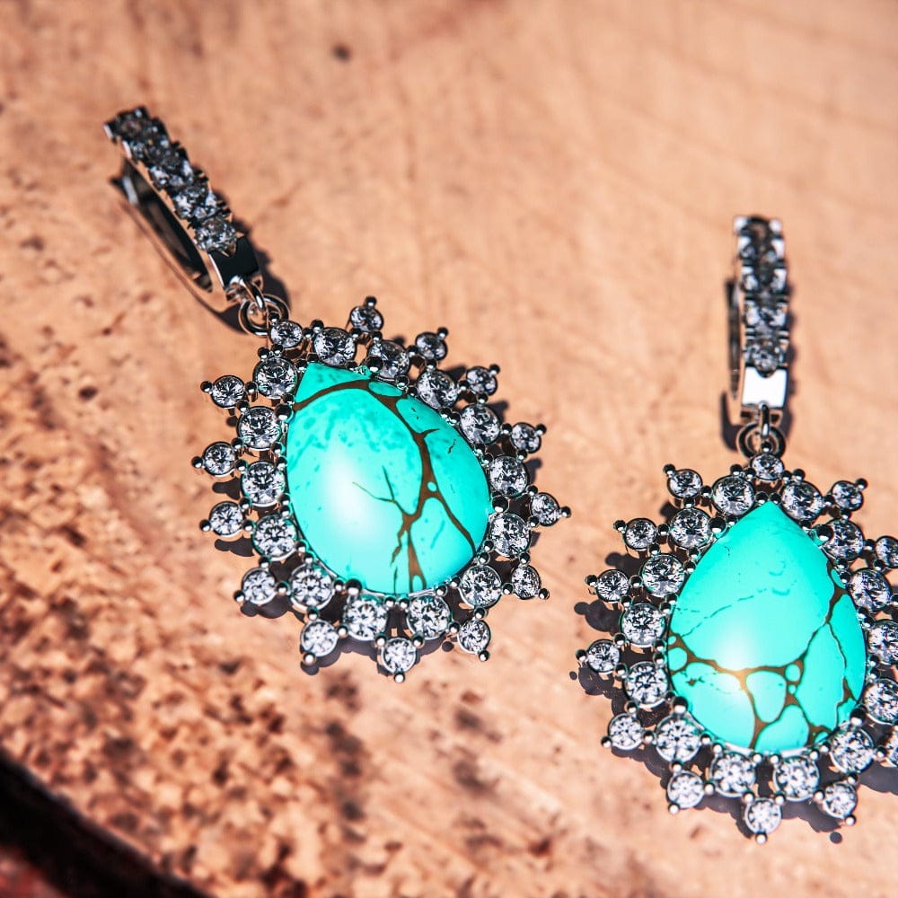 Blue Lagoon Turquoise Earrings featuring turquoise stones set in S925 sterling silver zoomed in close up view of the earrings in high detail