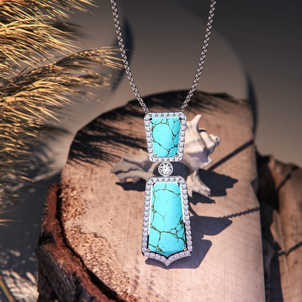 Turquoise Seabed Jewel Necklace featuring a turquoise pendant in a sterling silver setting frontal zoomed up view of pendant
