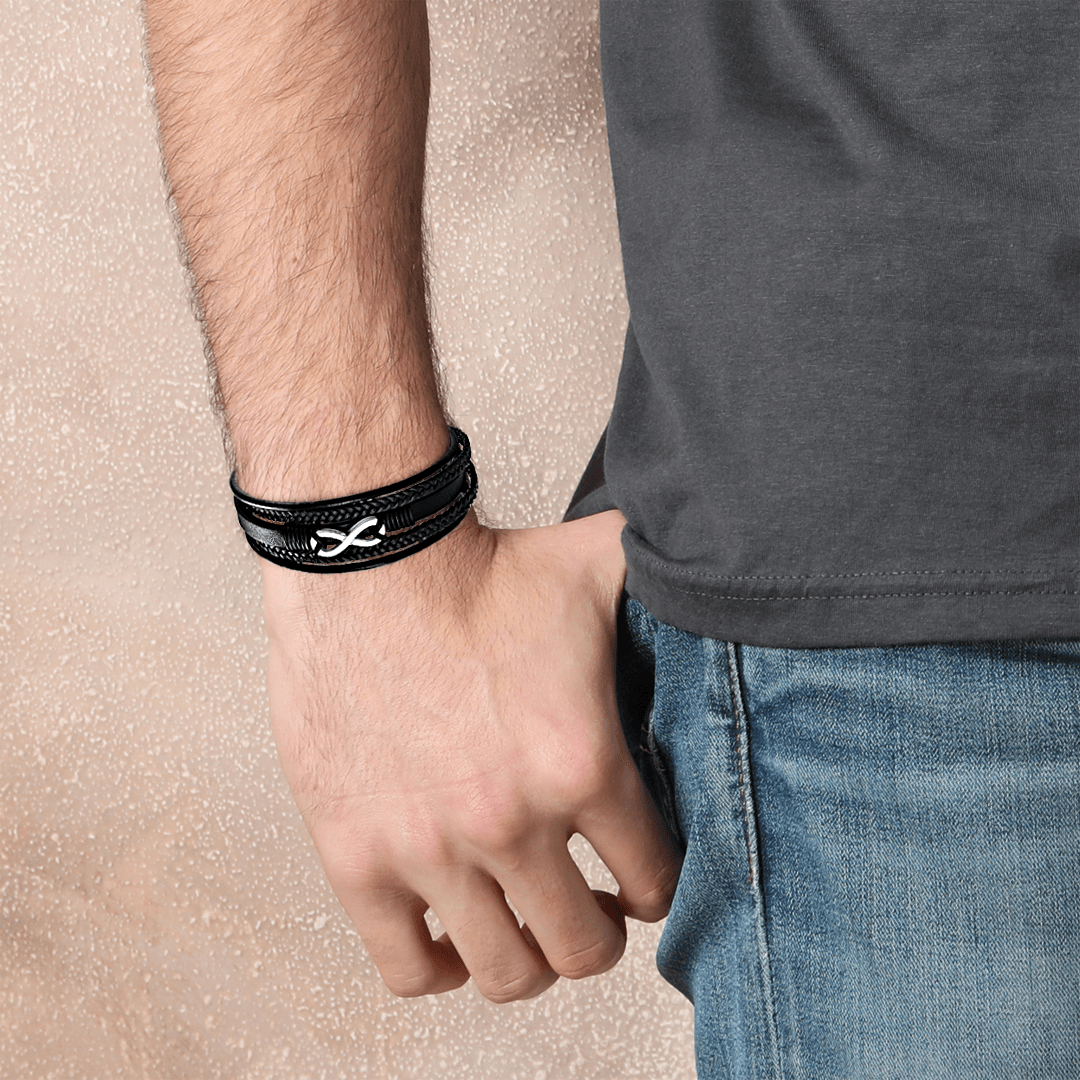 Pulsera trenzada de cuero con infinito para hombre